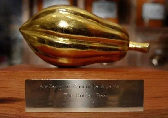 The Academy of Chocolate Golden Bean trophy